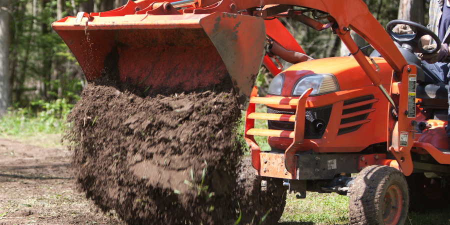 Tractor Hauling Soil